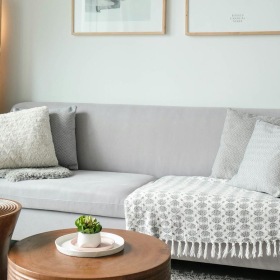 a living room with a couch and a coffee table